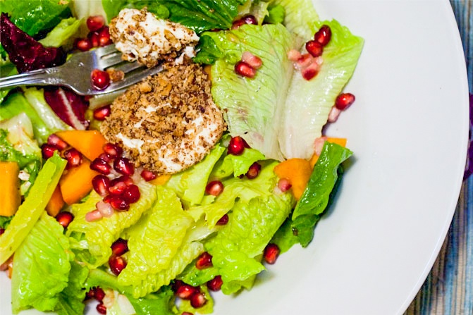 Persimmon and Pomegranate Salad with Pecan Crusted Goat Cheese