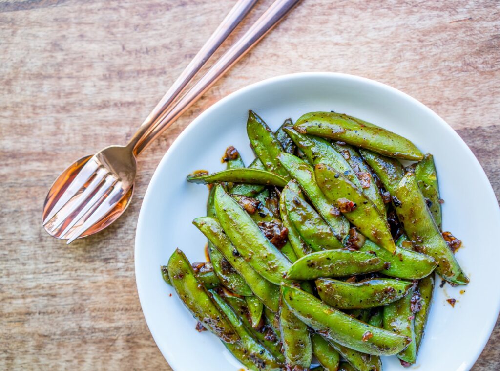 Sticky-Sweet Sugar Snap Peas - Nourish Evolution